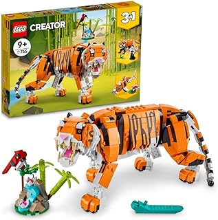 مجموعة النمر المهيب 3 في 1 رقم 31129 من LEGO Creator تضم نمرًا، وباندا حمراء اللون، وسمكة كوي للأطفال الذين تبلغ أعمارهم 9 سنوات أو أكثر (755 قطعة)